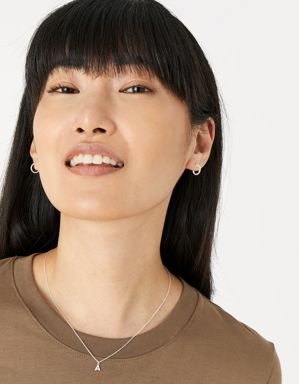 Accessorize exclusive disc pendant necklace in gold | ASOS