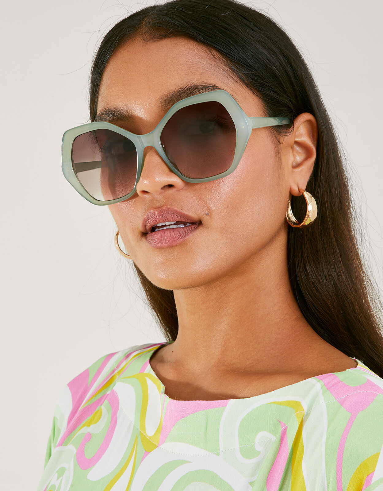 Valentino Eyewear hexagonal oversized V logo sunglasses - ShopStyle